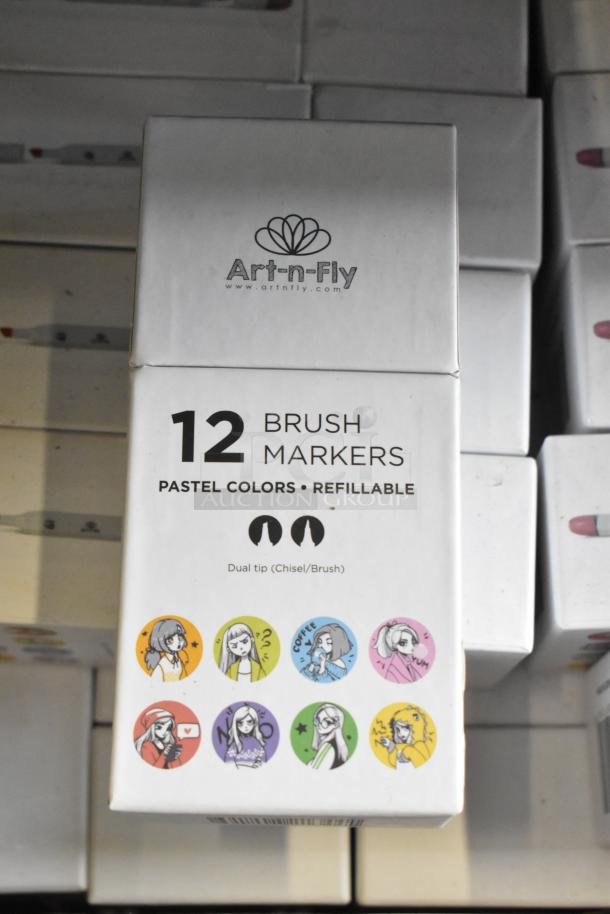 Box of Art-n-Fly 12 brush markers, dual tip with pastel colors, refillable, featuring illustrations on packaging.