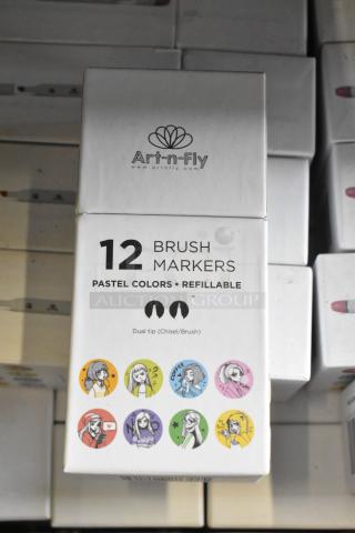 Box of Art-n-Fly 12 brush markers, dual tip with pastel colors, refillable, featuring illustrations on packaging.