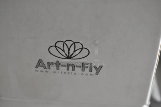 "Art-n-fly logo on box. Contains 12 brush markers, brand label visible, in good condition."