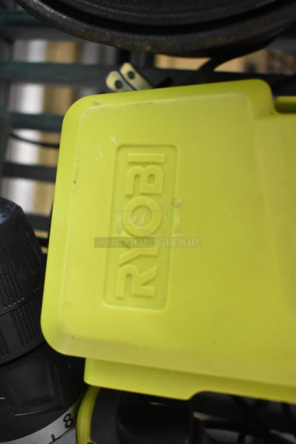 Ryobi HJP003 Drill/Driver with bit set, featuring a green case. Visible Ryobi logo, in good condition.