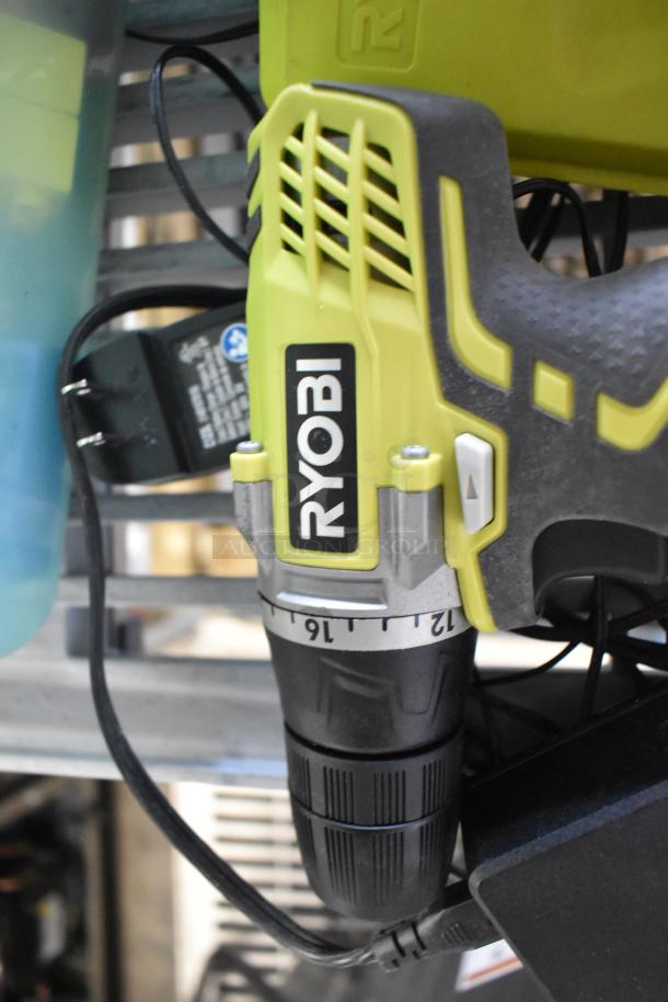 Ryobi HJP003 Drill/Driver, features adjustable torque settings, ergonomic grip, includes bit set, visible brand label.