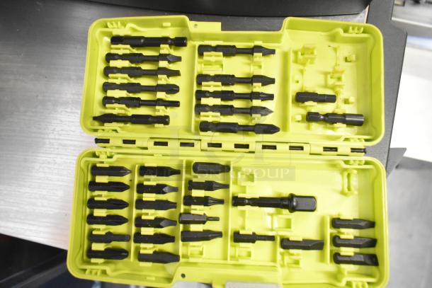 Ryobi HJP003 drill/driver bit set in yellow case, showcasing various black drill bits neatly arranged.