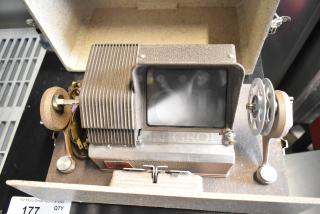 Craig KE-8 Projecto-Editor in hard case, features 110-120 volts, 1 phase. Includes screen and reel mechanism, good condition.