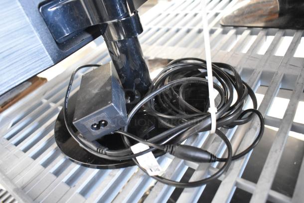 Three monitors including Asus VG249, Samsung S23C350H, HP; power cables visible, used condition.