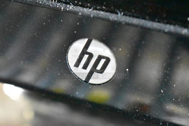 Three monitors including Asus VG249, Samsung S23C350H, HP; close-up of HP logo shown. Auction with triple bid value.