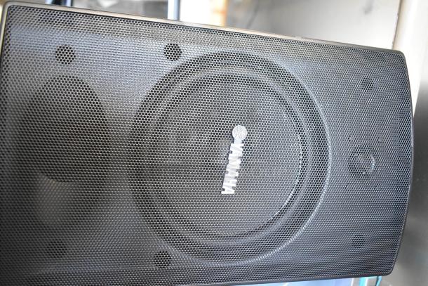 4 Yamaha NS-AW150 8 ohm speakers in black, showing Yamaha logo on grille. Good condition, ideal for indoor/outdoor use.