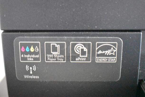 HP countertop printer scanner copier machine with wireless, ePrint, Energy Star, four separate inks, and 250-sheet tray.