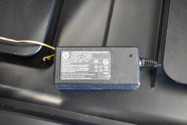 HP countertop printer scanner copier machine with power adapter model 0957-2385, shows minor wear, in good condition.