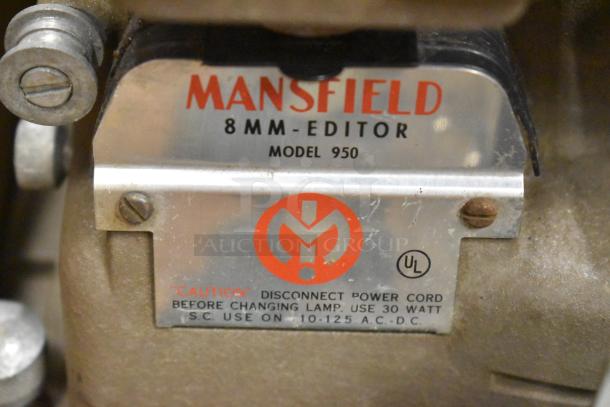 Mansfield 950 8mm Editor, shown with label indicating model, UL spec, and caution to disconnect before changing lamp.