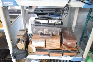 Eight assorted items, including a Marsand bag, cassette tapes, and a mailbox. Condition varies; bidding increases value.