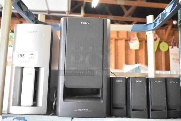 Sony speaker set including SA-W303 model and subwoofer, in used condition; auction quantity is six items.