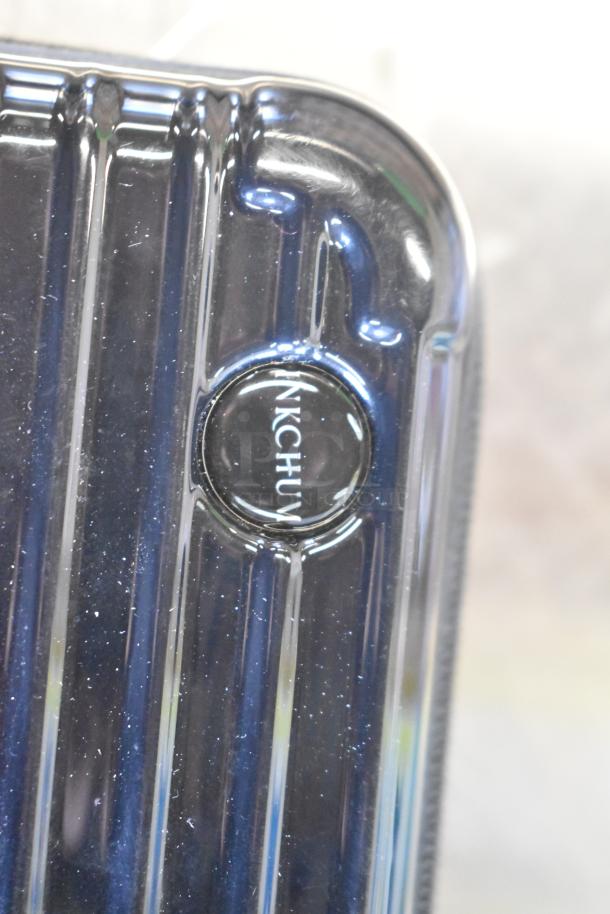 Two-tier lot featuring fishing lures, wind chimes, and a Nintendo Switch controller holder. Appears in good condition.