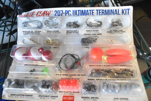 Clamshell packaging of a 207-piece fishing kit, including various hooks, floats, and sinkers. Appears new, with labeled sections.