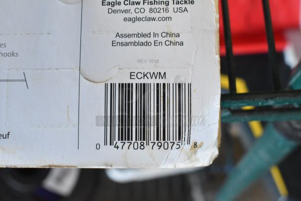 Eagle Claw Fishing Tackle box with barcode, model ECKWM, assembled in China. Box has visible wear.