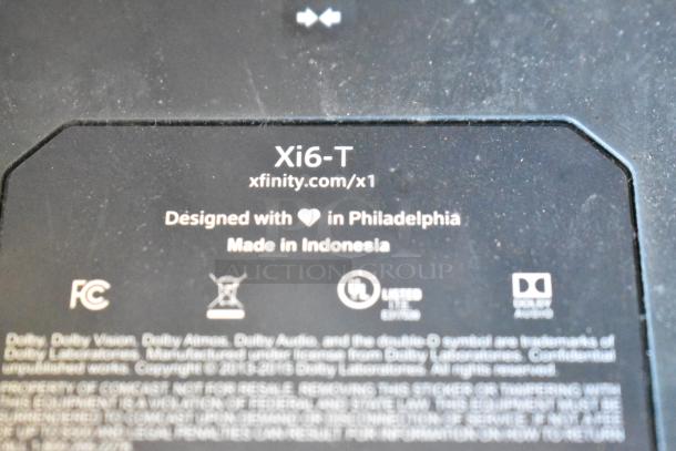 Two-tier lot including fishing lures, windchimes, Nintendo Switch controller holder, and Xi6-T device label, designed in Philadelphia, made in Indonesia.