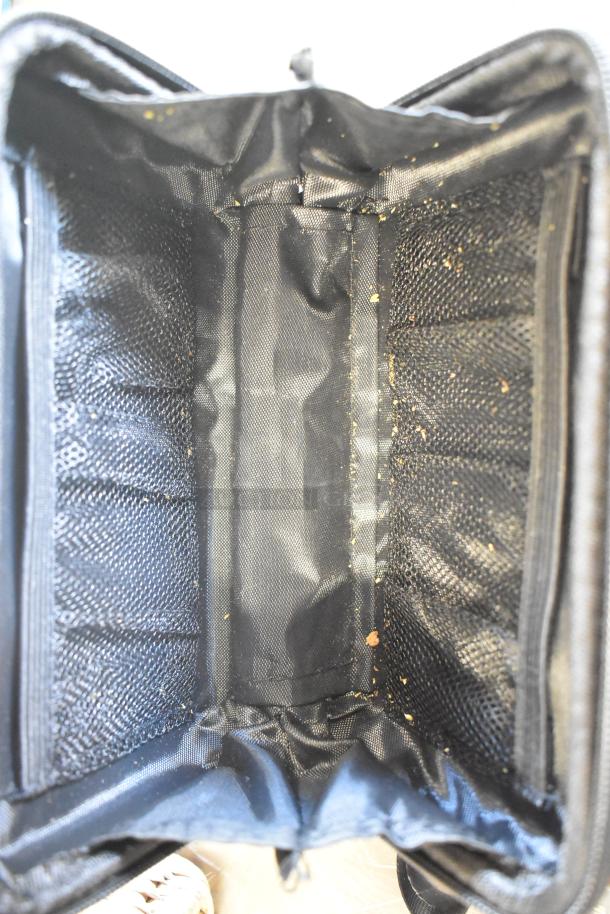 Two-tier lot featuring fishing lures, windchimes, and a Nintendo Switch controller holder. Items in varied condition.