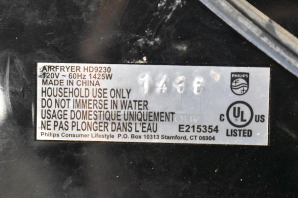 Philips HD9230 Air Fryer label showing 120V, 60Hz, 1425W; made in China; household use only; UL listed.