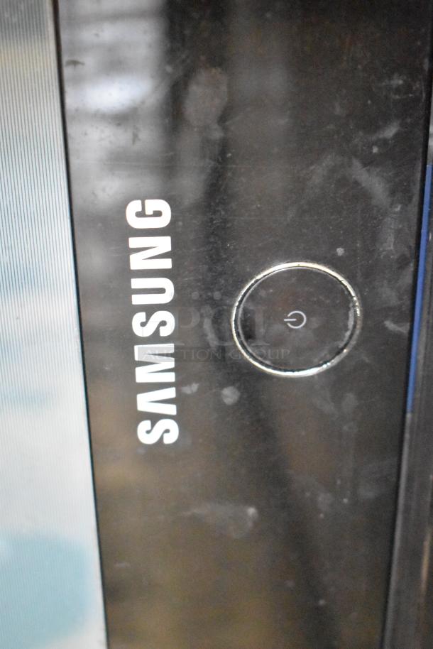 Samsung PN50A400C2DXZA 50" TV, visible logo and power button. Local pickup required.