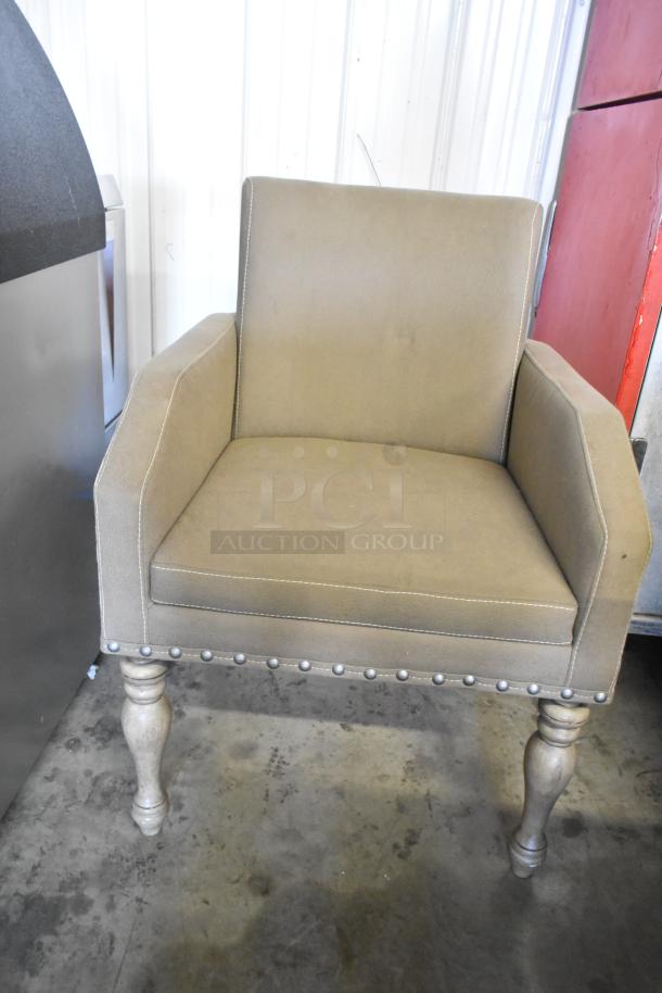 Elegant wooden dining chair with beige upholstery, nailhead trim, turned legs, in good condition, part of set.