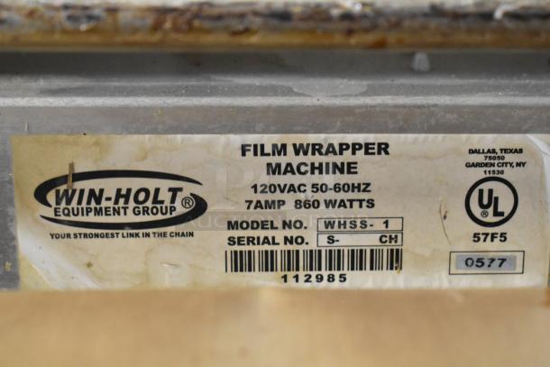 Win-holt WHSS-1 Film Wrapper Machine, metal countertop model, 120V, 1 phase, labeled with model and serial numbers.