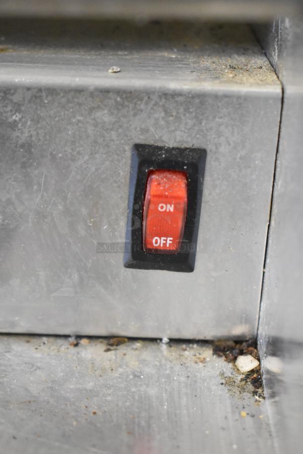 Win-holt WHSS-1 metal countertop film wrapper switch, showing red on-off button. Machine operates on 120 volts, 1 phase.