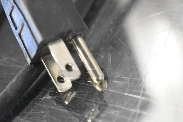 Win-holt WHSS-1 metal countertop film wrapper machine plug, 120 volts, 1 phase connection, close-up view.