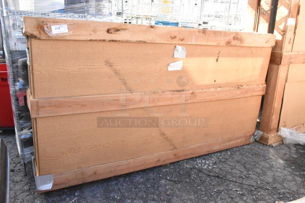 Brand new 36"x84" door with minor scratches and dents, wooden construction, packaging intact. Item label visible.