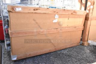 Brand new 36"x84" door with minor scratches and dents, wooden construction, packaging intact. Item label visible.