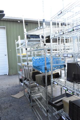 Chrome finish 6-tier wire shelving unit with poly beverage dispensers. Includes contents. Buyer must dismantle.