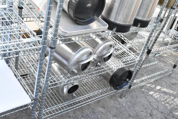 Chrome finish 6-tier wire shelving unit with Corny kegs. Buyer must dismantle. Consider freight charges.