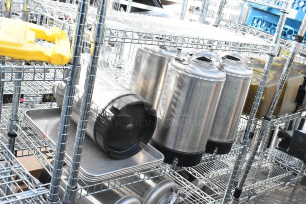 Chrome finish 6-tier wire shelving unit with contents including Corny kegs. Condition: used. Buyer must dismantle.