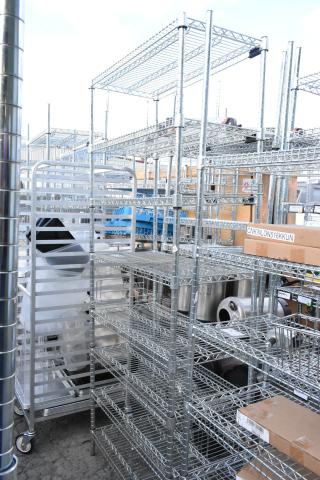 Chrome finish 8-tier wire shelving unit with contents, requires buyer dismantling, shipping considerations advised.