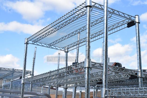 Chrome finish 8-tier wire shelving unit with contents. Item requires buyer dismantling. Consider freight charges.