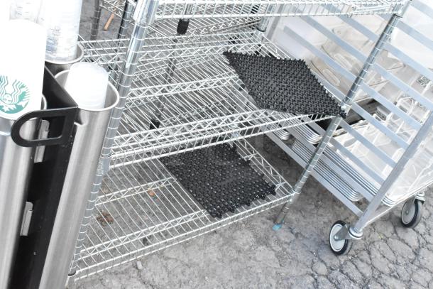 Chrome finish 6-tier wire shelving unit in good condition. Buyer must dismantle. Suitable for storage. Consider freight charges.