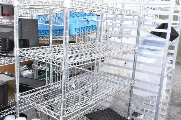 Chrome finish 6-tier wire shelving unit, sturdy construction, dismantling required by buyer, ideal for storage, good condition.