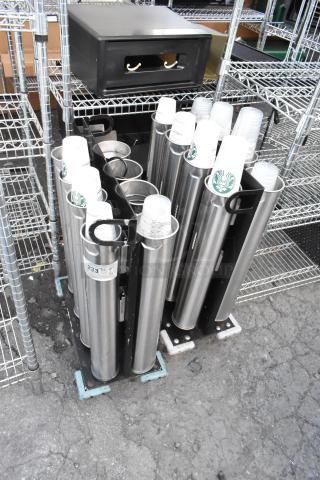 Two metal carts with eight stainless steel cup dispensers, each with logo cups; good condition, auction item tag visible.