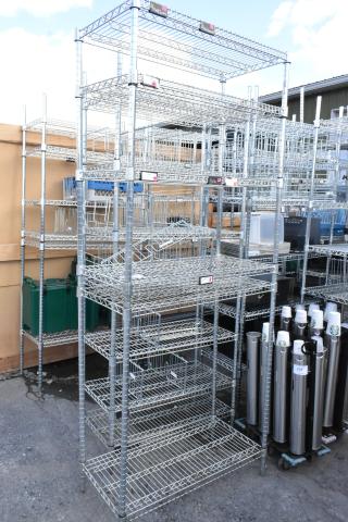 Chrome finish 6-tier wire shelving unit, used, sturdy design. Buyer must dismantle. Consider freight charges.