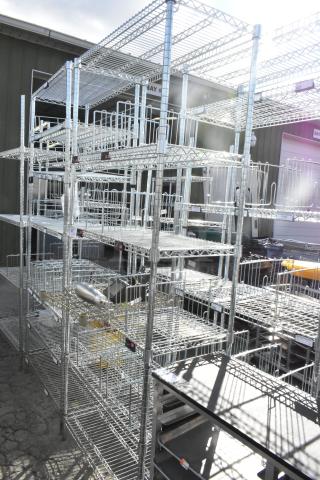 Chrome finish 6-tier wire shelving unit in excellent condition. Buyer must dismantle. Consider freight charges.