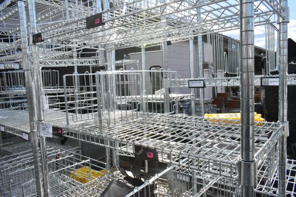 Chrome finish 6 tier wire shelving unit, excellent condition, with multiple labels. Buyer dismantles; freight charges apply.