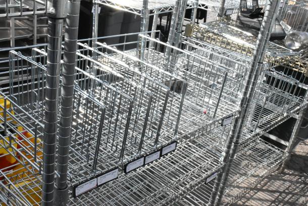 Chrome finish 5 tier wire shelving unit, sturdy metal construction. Tags visible, buyer dismantles. Consider freight charges.
