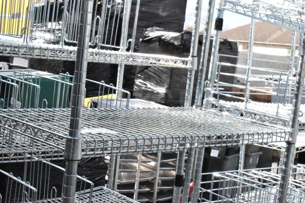 Chrome finish 4-tier wire shelving unit, durable metal construction, slightly used condition; buyer must dismantle.
