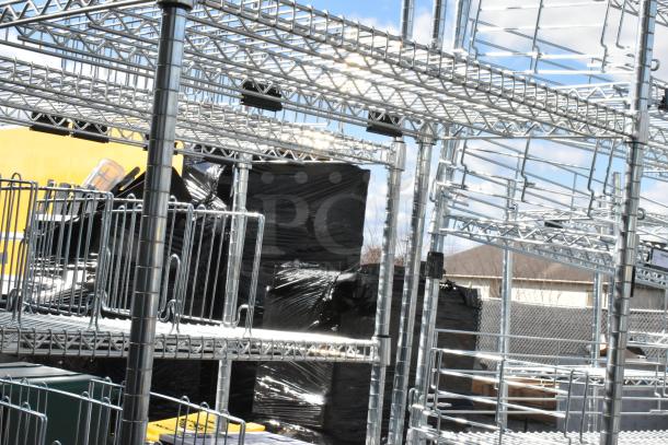 Chrome Finish 4 Tier Wire Shelving Unit, in excellent condition, buyer must dismantle, consider freight charges.