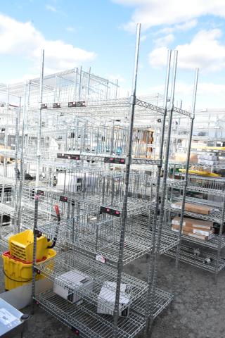 Chrome finish 6-tier wire shelving unit, industrial design. Sturdy, large capacity. Buyer must dismantle for shipping.