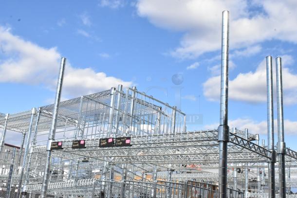 Chrome finish 6-tier wire shelving unit in excellent condition, assembled. Buyer must dismantle. Consider freight charges.
