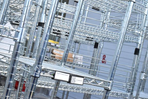 Chrome finish 6-tier wire shelving unit, excellent condition, sturdy metal construction, buyer dismantle required.