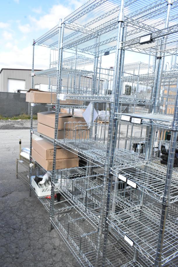 Chrome finish 6-tier wire shelving unit, used condition, loaded with boxes, buyer must dismantle, consider freight charges.