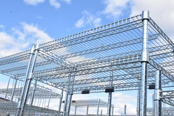 Chrome finish 6-tier wire shelving unit, sturdy and spacious, suitable for various storage needs. Buyer must dismantle.