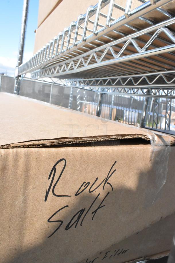 Chrome finish 6-tier wire shelving unit with contents. Includes "Rock Salt" labeled box. Buyer must dismantle for shipping.
