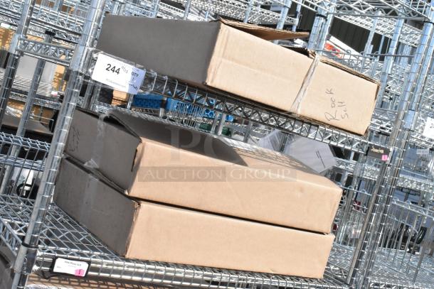 Chrome 6-tier wire shelving unit with boxes. Includes dismantling notice and freight charge reminder.