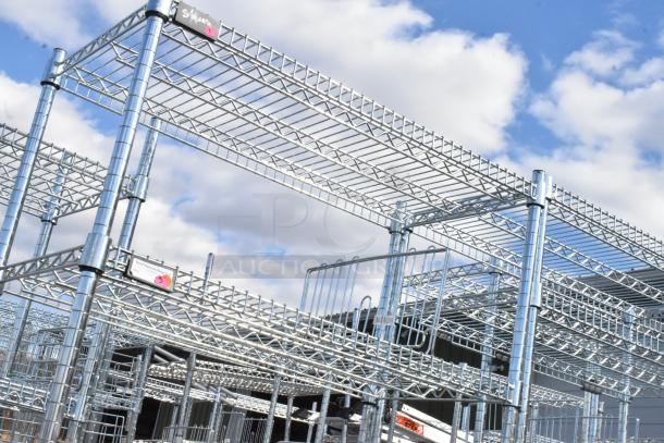 Chrome finish 6-tier wire shelving unit with contents, excellent condition, visible labels. Buyer must dismantle for shipping.